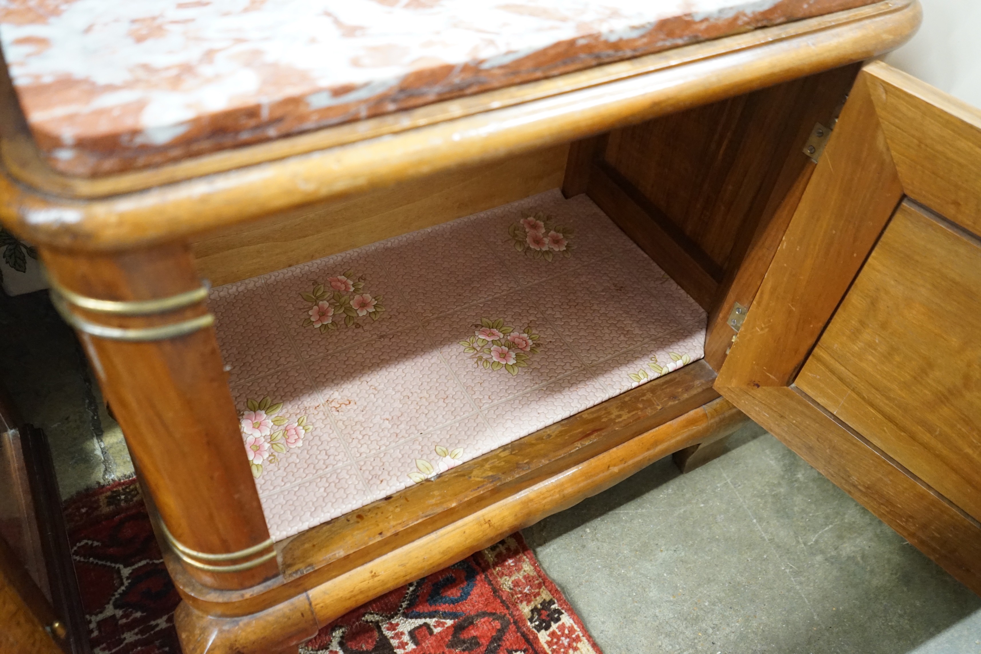 An early 20th century French marble topped carved walnut low cabinet, length 64cm, depth 35cm, height 61cm